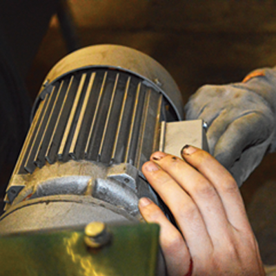 Maintenance of biomass boilers - close up of motor