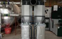 The biomass plant room, ash bins, buffer tank and Herz BioFire
